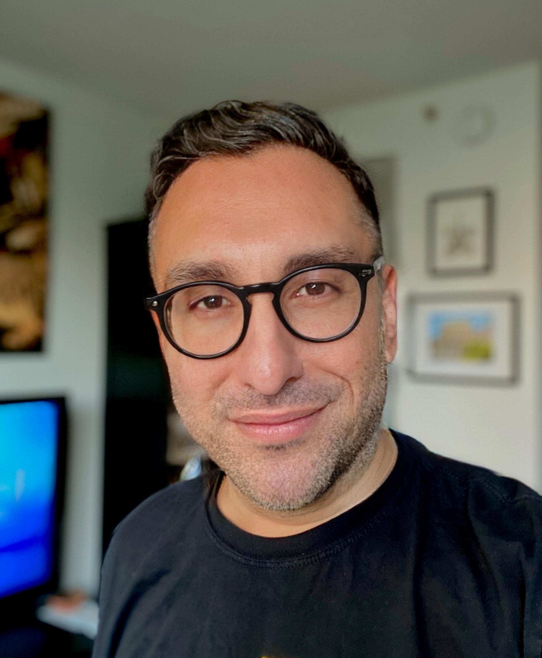 Professional headshot of Rehman Ali, Coach and Strategist